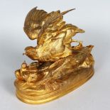 ALEX ALPHONSE ARSON (1822-1880) FRENCH A GILT BRONZE GROUP OF A BIRD FEEDING CHICKS. Signed. 7.