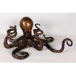 AN UNUSUAL BRONZE OF AN OCTOPUS. 12ins high, 24ins wide.