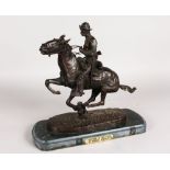 AFTER FREDERIC REMINGTON TROOPER OF THE PLAINS. Signed, on a marble base. 12ins high.