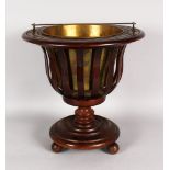 A DUTCH MAHOGANY BUCKET with brass handle and liner.