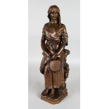 A GOOD BRONZE OF A YOUNG GIRL standing holding a tambourine. Signed. 17ins high. No. 1064.