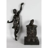 AFTER THE ANTIQUE A STANDING BRONZE FEMALE FIGURE on a column support. 29ins high.