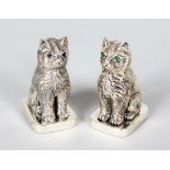 A PAIR OF MINIATURE NOVELTY SILVER "CAT" SALT AND PEPPER.