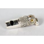 A NOVELTY SILVER OWL WHISTLE.