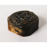 A CHINESE DARK GREEN JADE SEAL.