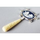 A MINIATURE SILVER CAMEO RATTLE.