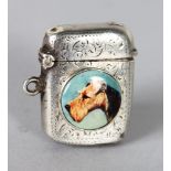 A VICTORIAN SILVER VESTA as a light with dog's head.