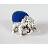 A MINIATURE SILVER ELEPHANT PIN CUSHION.