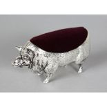 A SILVER .800 PIG PIN CUSHION.