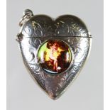 A MINIATURE SILVER HEART SHAPED VESTA with a nude.