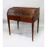 A GEORGE III MAHOGANY CYLINDER BUREAU, with curving tambour top opening to reveal a fitted
