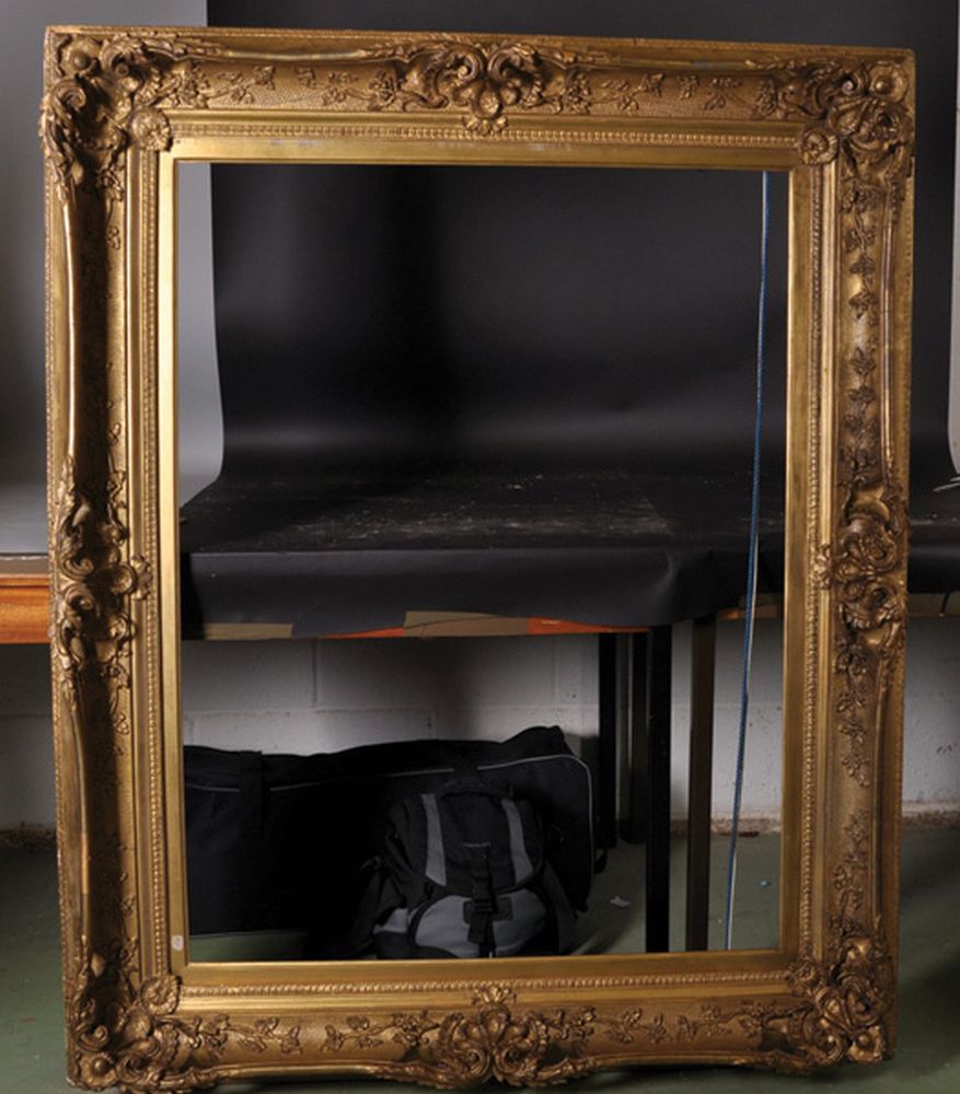 19th Century English School. A Swept and Pierced Gilt Composition Frame, 43" x 32.5". - Image 2 of 3