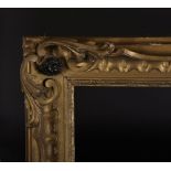 18th Century English School. A Rococo Style, Swept, Pierced Carved Giltwood Frame, 50" x 40", and