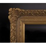 20th Century English School. A Swept Gilt Composition Frame, 30" x 25".