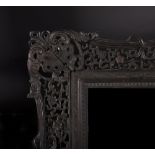 19th Century Chinese School. A Swept, Pierced Carved Wood Frame, 29.5" x 23.5".
