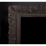 19th Century Chinese School. A Carved Wood Frame, 34" x 20.75".