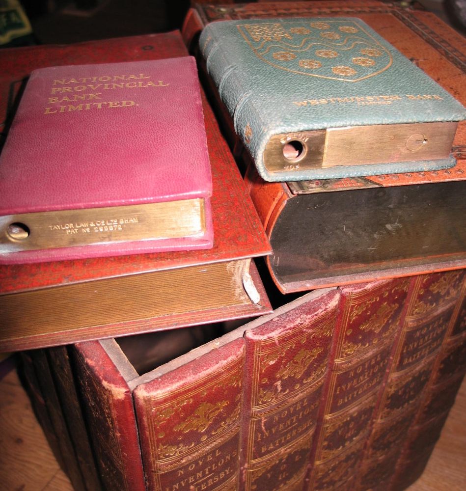 BOOK BOXES; a Huntley & Palmer's tin in the form of a book; & other faux books.