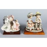 A PAIR OF CAPO-DI-MONTE PORCELAIN GROUPS by G. ARMANI. Signed.