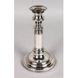 A SHEFFIELD TELESCOPE CANDLESTICK on a loaded circular base.