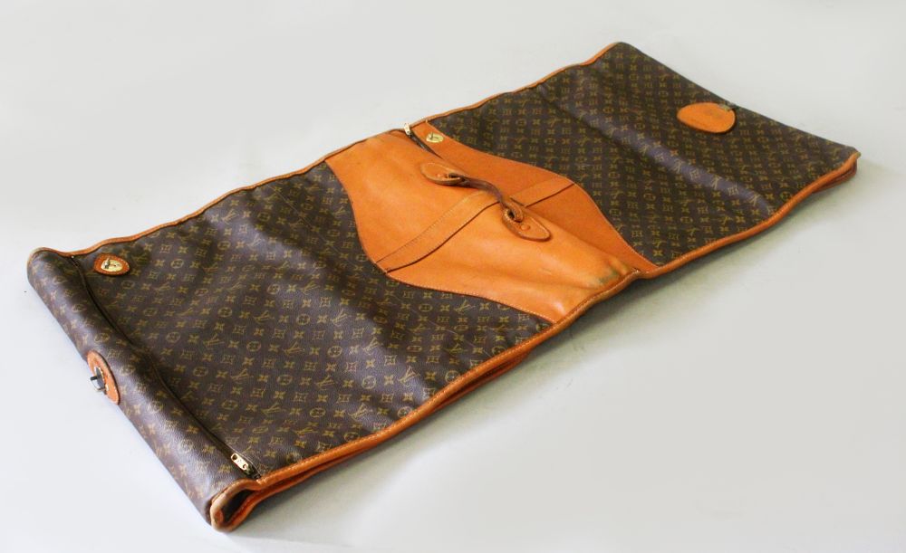 LOUIS VUITTON, A LEATHER AND MONOGRAMMED LEATHER SUIT HOLDER (from the Estate of Ava Astaire - Image 2 of 2