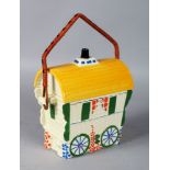 A PORCELAIN GYPSY WAGON.