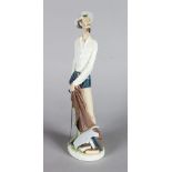 A LLADRO PORCELAIN FIGURE "QUIXOTE STANDING UP" holding a sword. 11.75ins high. No. 4854.