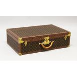 A LARGE LOUIS VUITTON CASE, No. 1074290, PARIS, with brass corners, hinges and lock, No. 290909, the