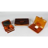 A LADIES FAUX TORTOISESHELL COMPACT with HERMES LIPSTICK, a smaller compact and a folding purse (