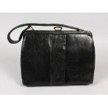 A MAPPIN & WEBB BLACK SKIN HANDBAG, 1960'S, interior lined with grey fabric, three interior pockets,