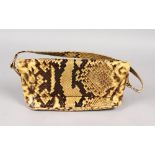 A SNAKESKIN HANDBAG, gilt metal hardware, interior lined with beige synthetic fabric and suede.