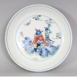 A CHINESE DOUCAI PORCELAIN SAUCER DISH, the interior decorated with a panel of Guandi seated on