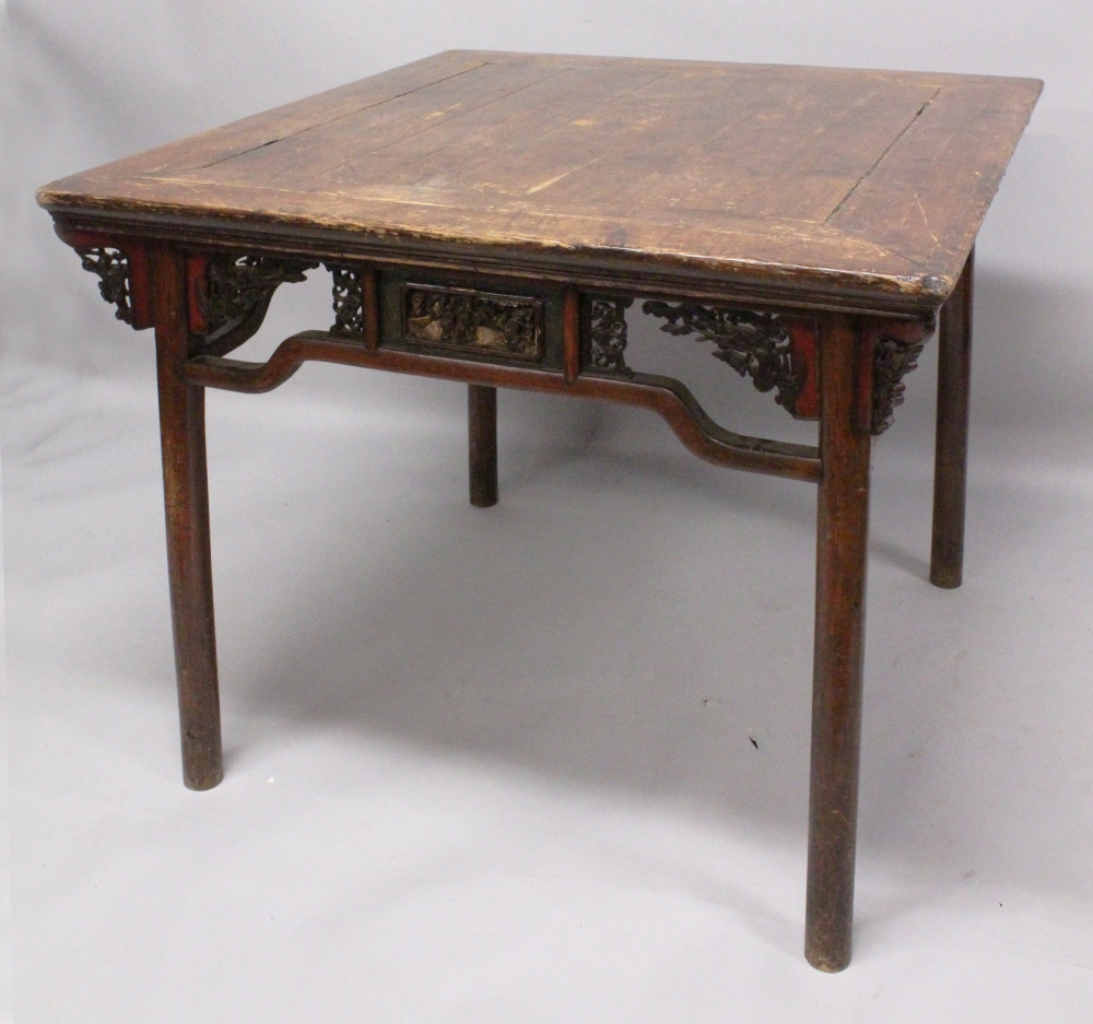 A 19TH CENTURY CHINESE SOFTWOOD SQUARE TABLE, with slightly flaring legs, the frieze centred on each