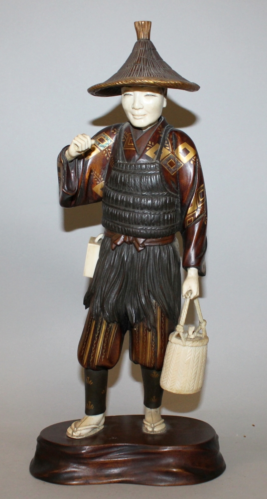 A GOOD SIGNED JAPANESE MEIJI/TAISHO PERIOD LACQUERED WOOD & IVORY SECTIONAL FIGURE OF A FISHERMAN,