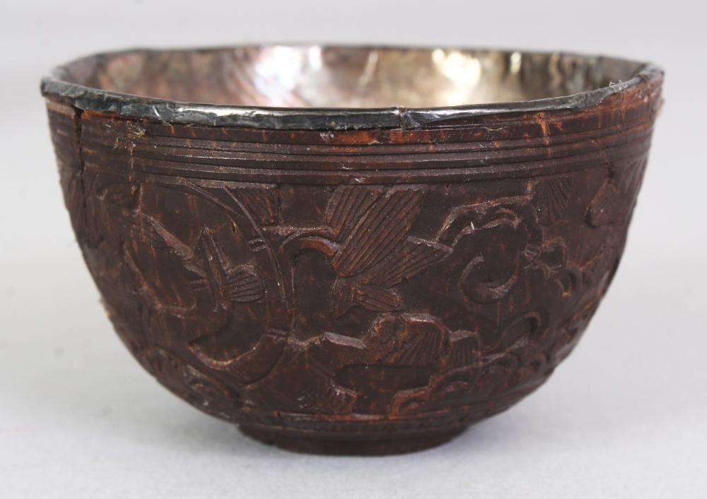 A GROUP OF FIVE 19TH CENTURY CHINESE COCONUT CUPS, with fitted silver liners some bearing an - Image 4 of 10