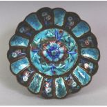 A SMALL EARLY 20TH CENTURY CHINESE ENAMELLED METAL FLOWER FORM DISH, decorated with floral sprays,