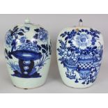 A NEAR PAIR OF 19TH/20TH CENTURY CHINESE BLUE & WHITE PORCELAIN JARS & COVERS, one painted with a