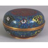 A 19TH/20TH CENTURY CHINESE CIRCULAR CLOISONNE BOX & COVER, the cover decorated with a panel of