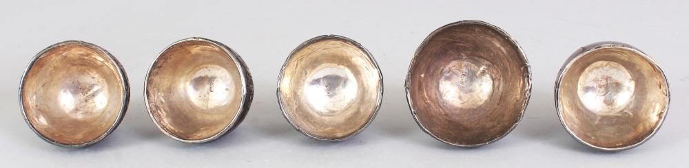 A GROUP OF FIVE 19TH CENTURY CHINESE COCONUT CUPS, with fitted silver liners some bearing an - Image 7 of 10