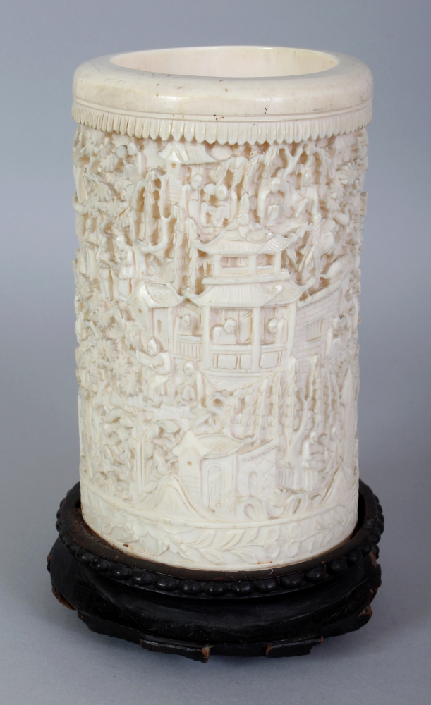 A GOOD LARGE 19TH CENTURY CHINESE CANTON IVORY BRUSHPOT, together with a fixed wood stand, the sides - Image 4 of 7