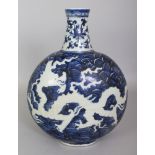 A CHINESE MING STYLE BLUE & WHITE PORCELAIN DRAGON MOON FLASK, each domed surface decorated in white