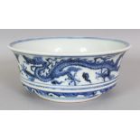 A CHINESE MING STYLE BLUE & WHITE PORCELAIN DRAGON BOWL, with an everted lip, the sides decorated