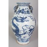 A CHINESE YUAN STYLE BLUE & WHITE PORCELAIN DRAGON VASE, with double chilong-style handles, the base