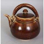 A CHINESE SONG STYLE BROWN GLAZED EWER & COVER, the overhead handle moulded in the form of a