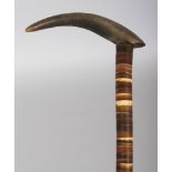 ANOTHER HORN WALKING STICK, possibly partially rhinoceros horn, the shaft formed from graduated