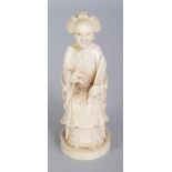 A GOOD QUALITY 19TH CENTURY CHINESE CARVED IVORY FIGURE OF AN EMPRESS, seated in a horseshoe