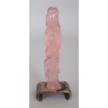 A SMALL 20TH CENTURY CHINESE ROSE QUARTZ CARVING OF GUANYIN, together with a fixed wood stand, the