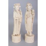 A GOOD PAIR OF EARLY 20TH CENTURY CHINESE IVORY FIGURES OF AN EMPEROR & AN EMPRESS, each standing on