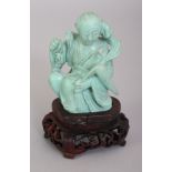 A 20TH CENTURY CHINESE TURQUOISE-STYLE MODEL OF A SEATED FEMALE IMMORTAL, together with a fitted