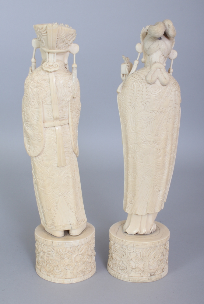 A GOOD PAIR OF EARLY 20TH CENTURY CHINESE IVORY FIGURES OF AN EMPEROR & AN EMPRESS, each standing on - Image 3 of 8