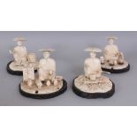 AN UNUSUAL GROUP OF FOUR JAPANESE MEIJI PERIOD SECTIONAL IVORY OKIMONO OF STREET VENDORS, all except